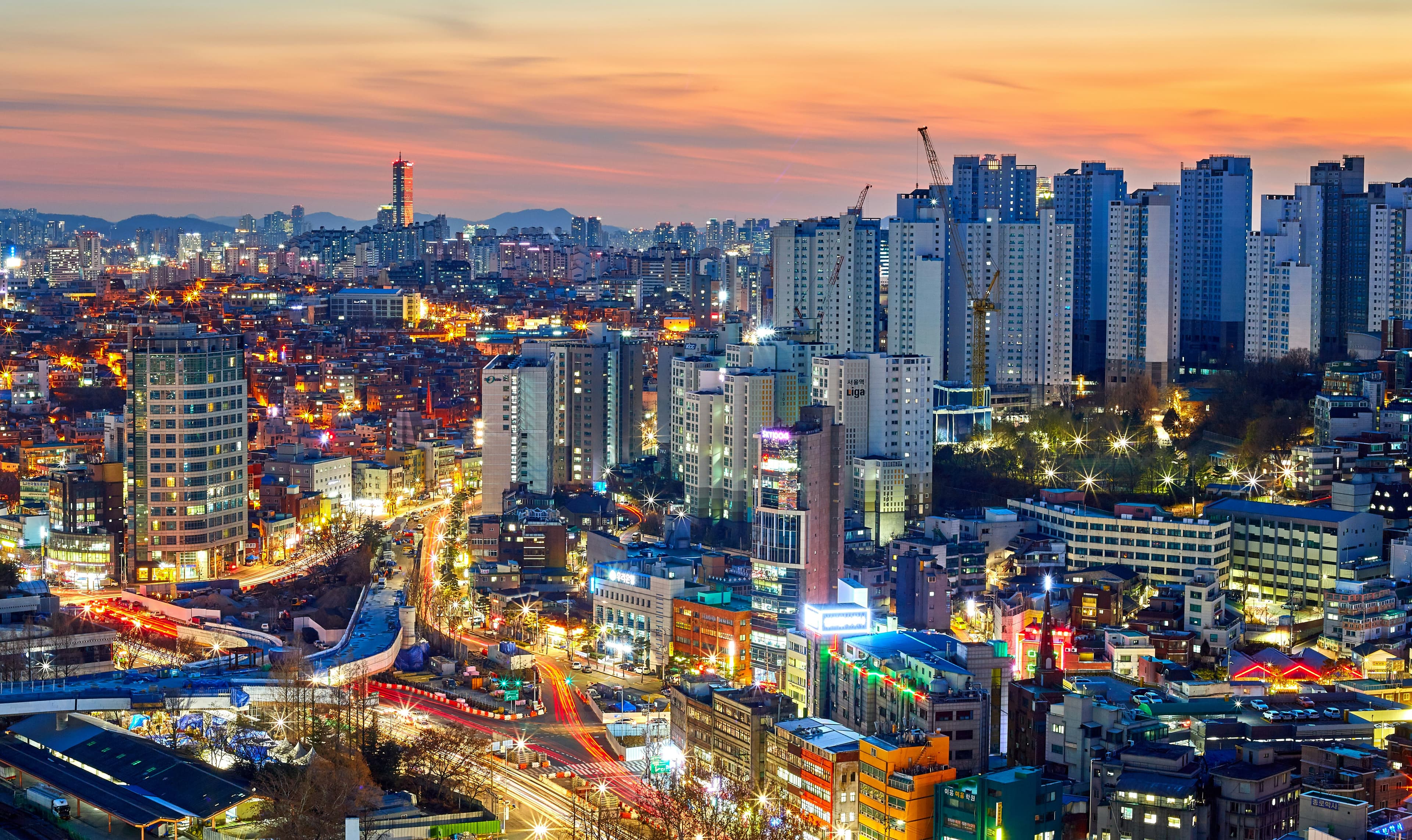Korean city skyline at sunset · Mathew Schwartz / Unsplash